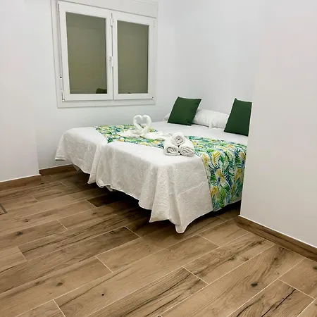 1 * Malaga